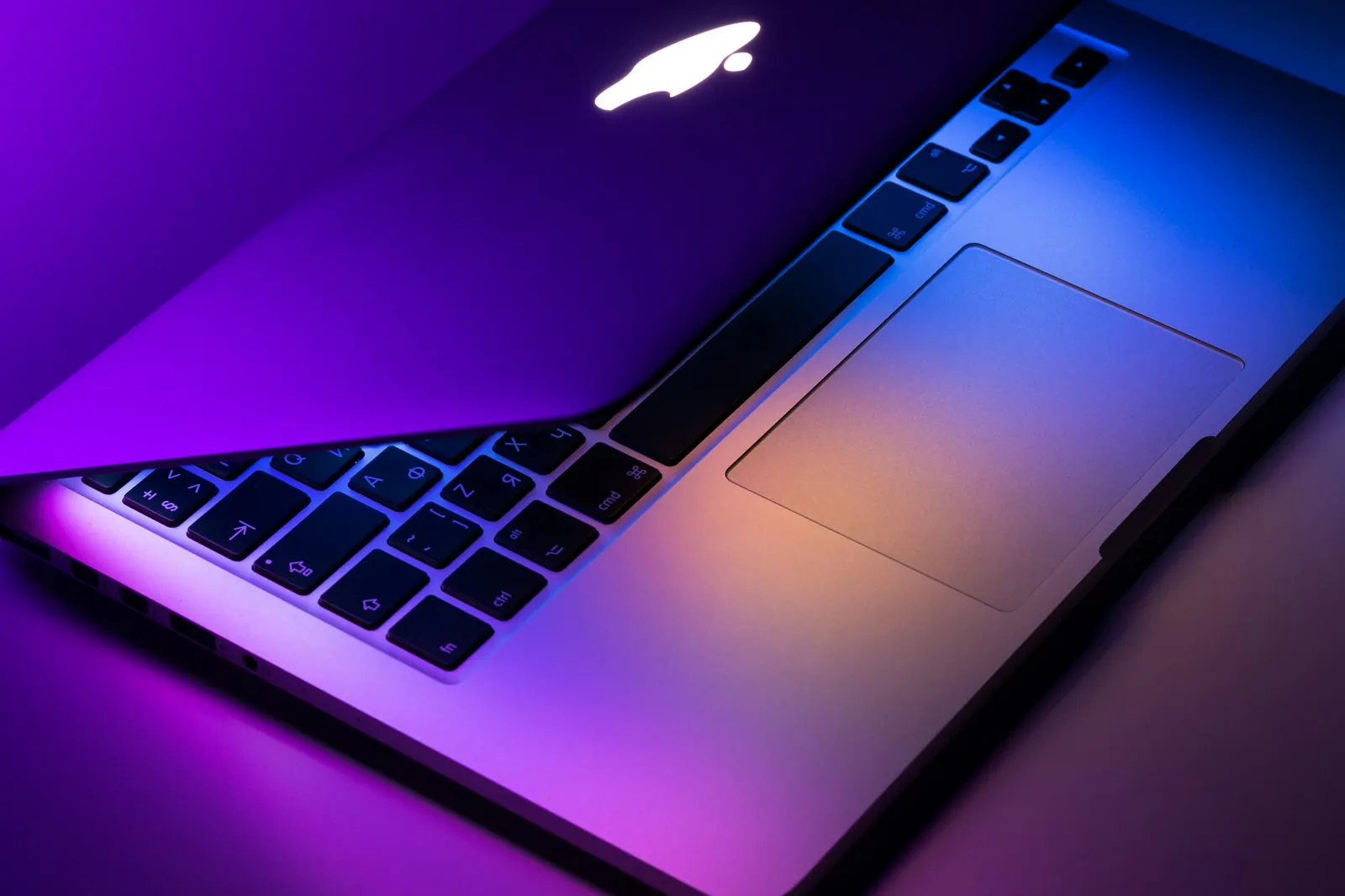 Laptop and devices representing Apple affiliate and partner programme marketing - ONS Infosolutions