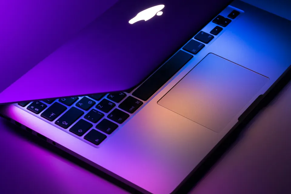Laptop and devices representing Apple affiliate and partner programme marketing - ONS Infosolutions